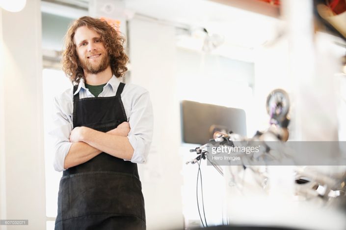 proud-bike-shop-owner-picture-id607032071