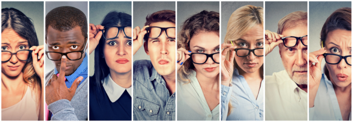 Multiethnic group of hard to please people skeptically looking at you